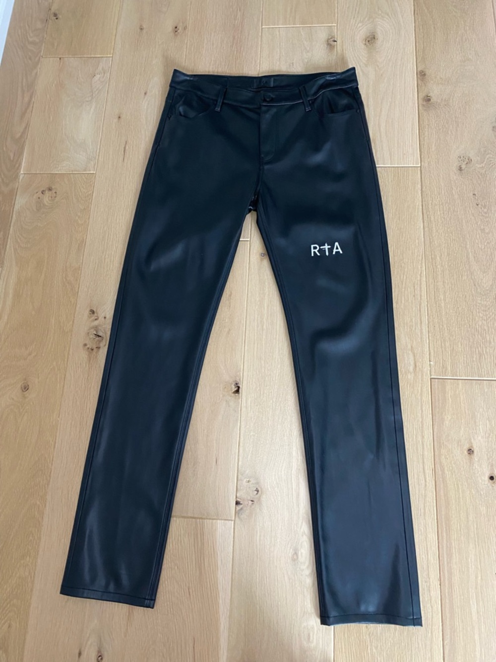 RtA Black Faux Men’s Leather Pants with Logo Button Detail. Size 32.